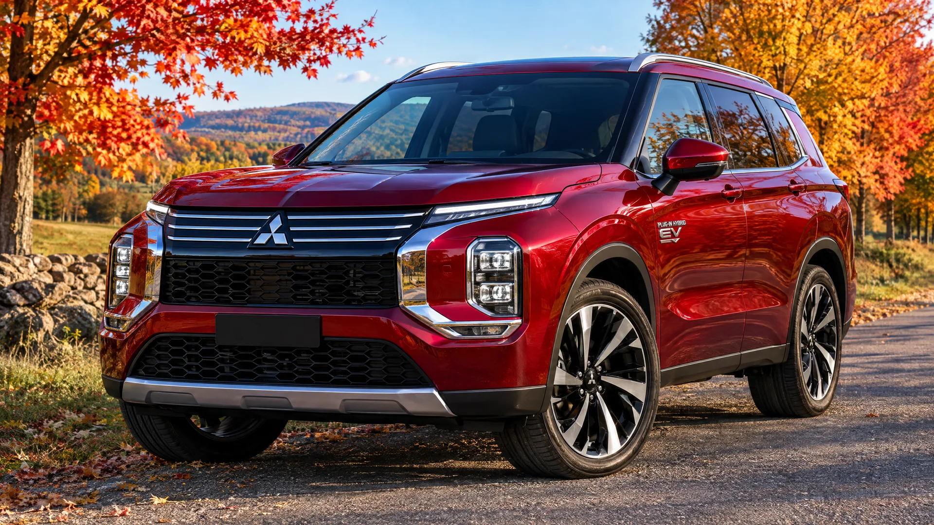 Mitsubishi Outlander PHEV 2026 rouge sur une route de campagne des Cantons-de-l'Est bordée d'érables aux couleurs d'automne, soleil bas